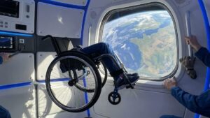 Unprecedented space flight: a paraplegic engineer crosses the frontier of space