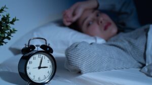 Here's why you never sleep well the first night you spend somewhere else (even in a cozy bed)