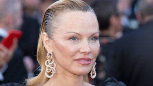 In Milan, Pamela Anderson is breaking away from her no-make-up era. And reveals a smoky you're going to want to copy